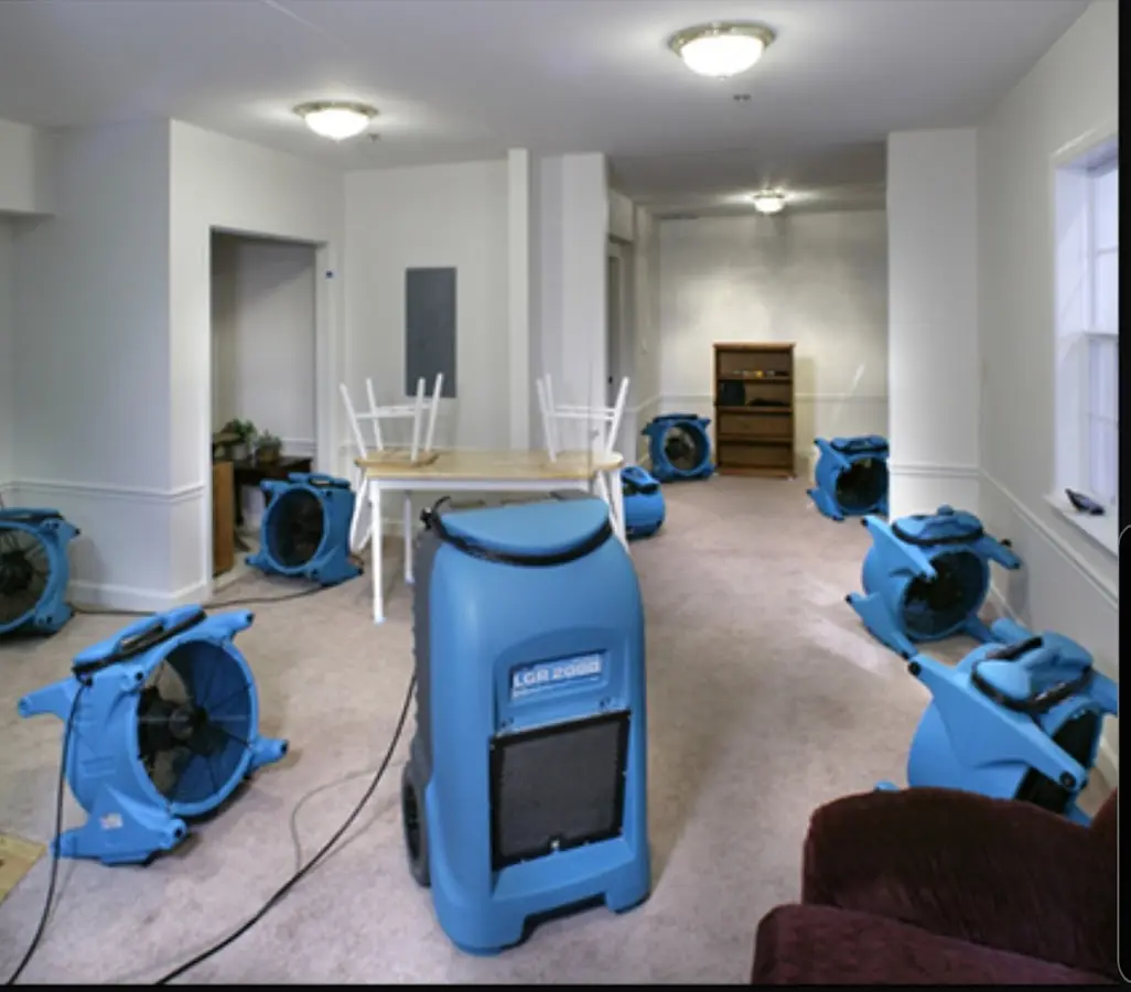 Air movers and dehumidifier setup for Water Damage Restoration in Ellettsville